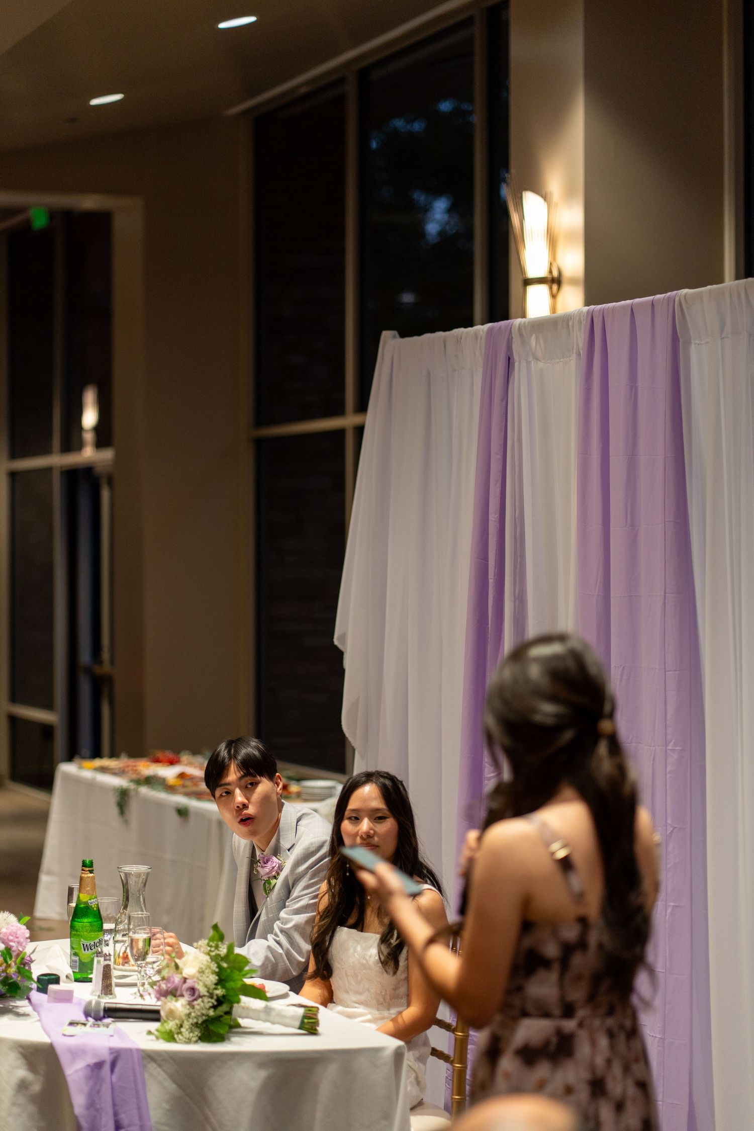 Guests share heartfelt words for the bride and groom, offering love and blessings.