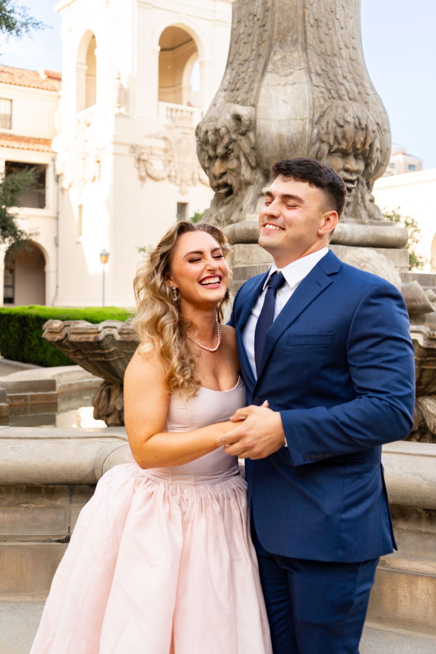 Newly engaged couple glowing with happiness on Pasadena City Hall stairs — love and new beginnings captured perfectly. #EngagementPhotos #Pa