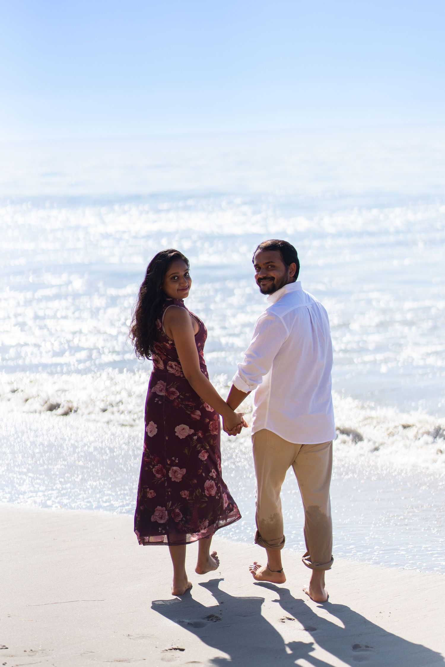 Couple having fun together on Malibu Beach