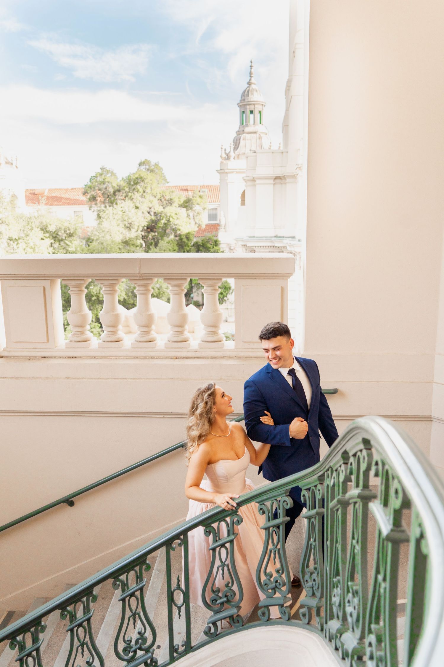 Newly engaged couple glowing with happiness on Pasadena City Hall stairs — love and new beginnings captured perfectly. #EngagementPhotos #Pa