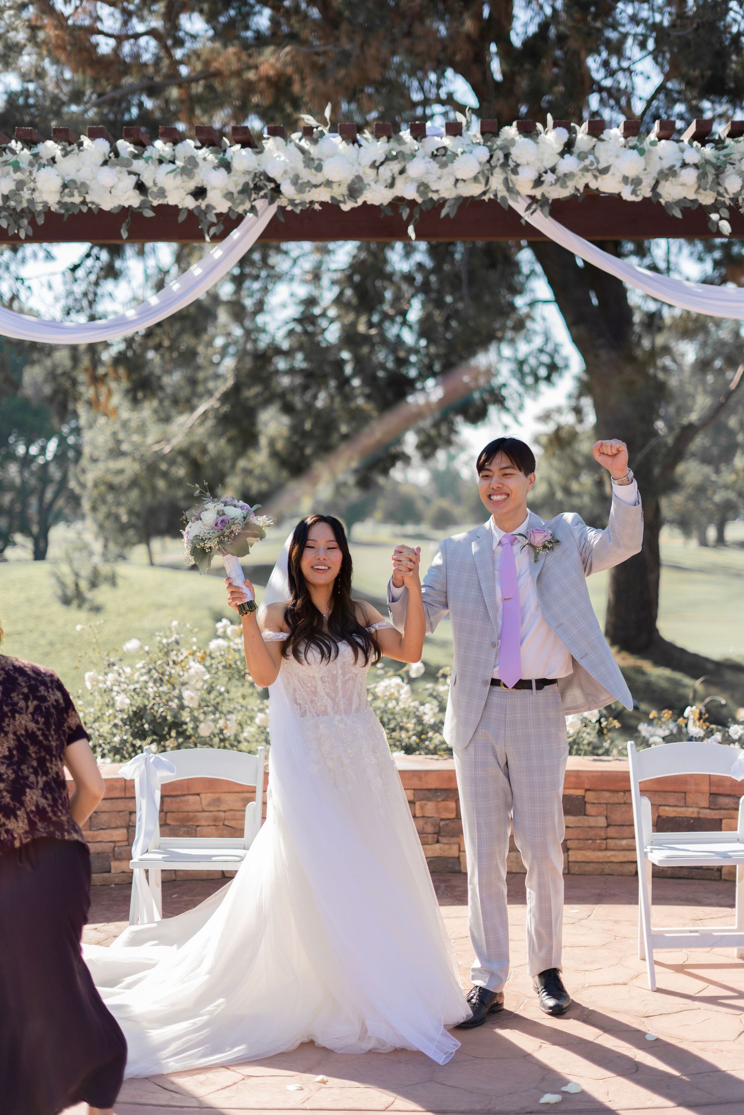 Bride and groom are now officially married, celebrating their love together.