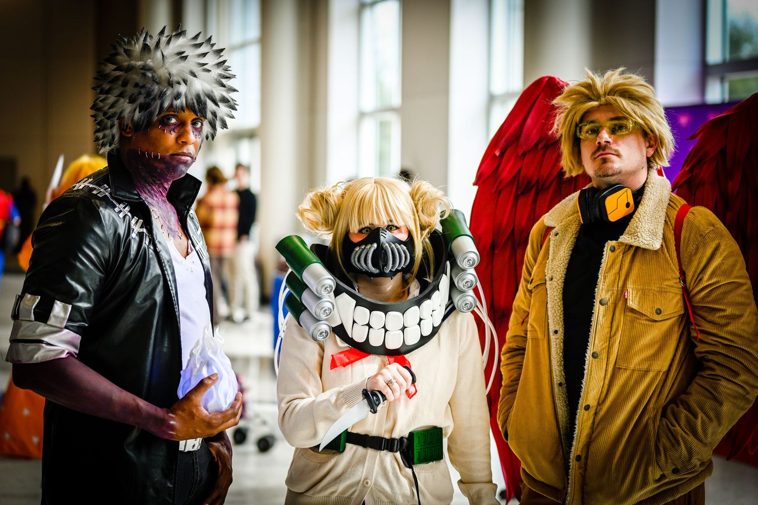 Candid shots of convention attendees interacting in a bright indoor space.