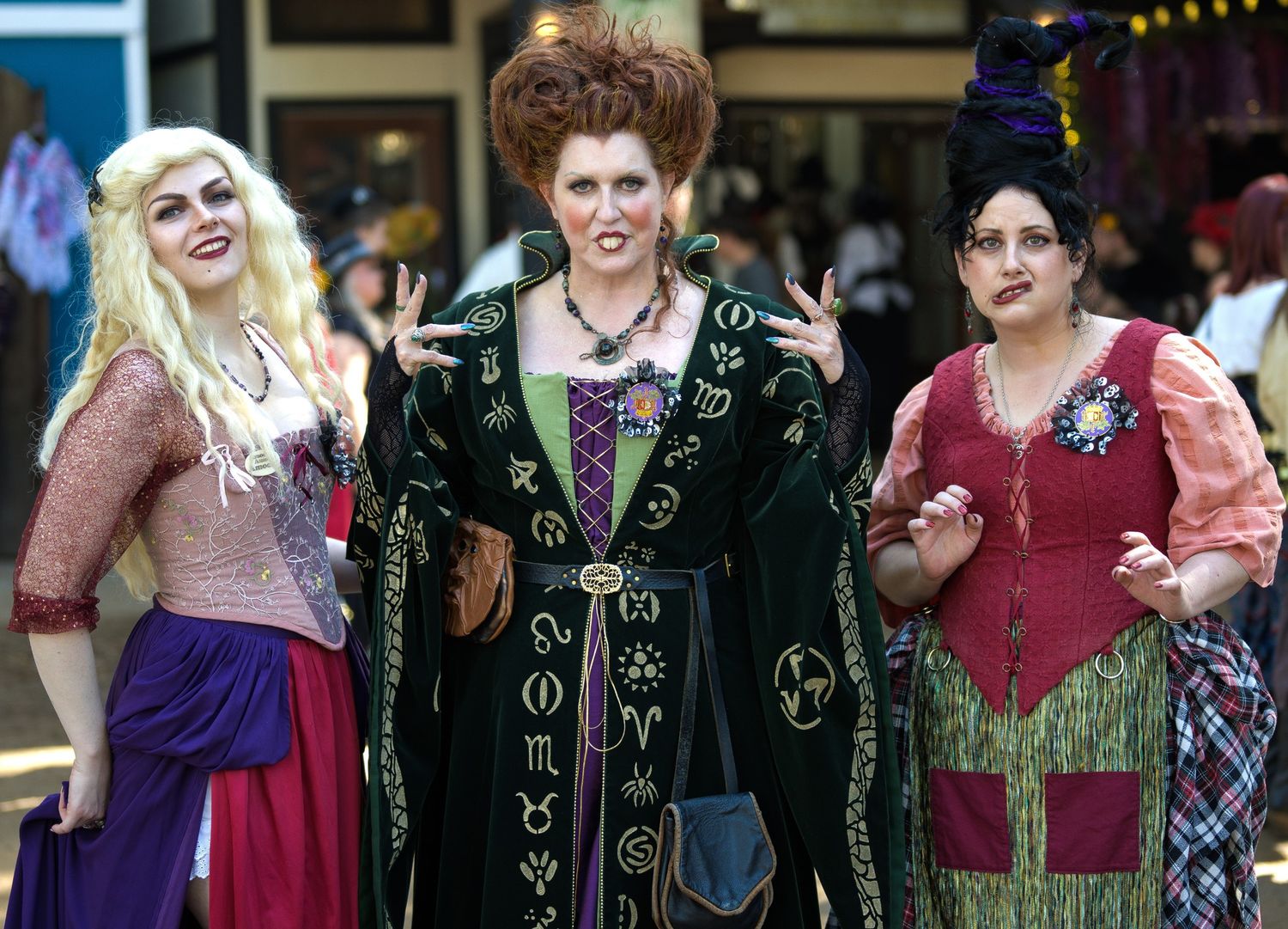 People in medieval and fantasy costumes gathered at a convention or festival.