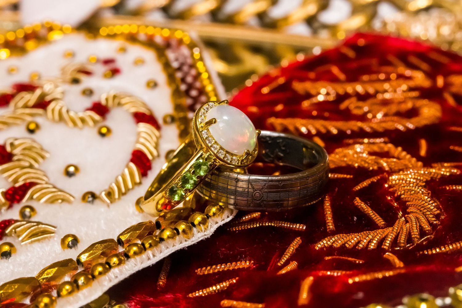 Close-up of golden jewelry and decorative items with intricate patterns and sparkly details.