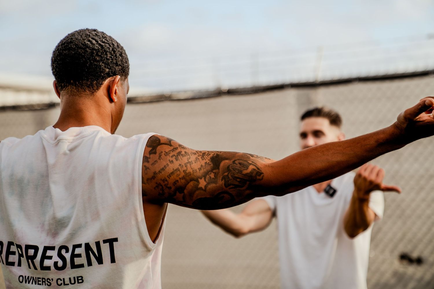Nashville Athletes practicing boxing moves outdoors in training sequence.