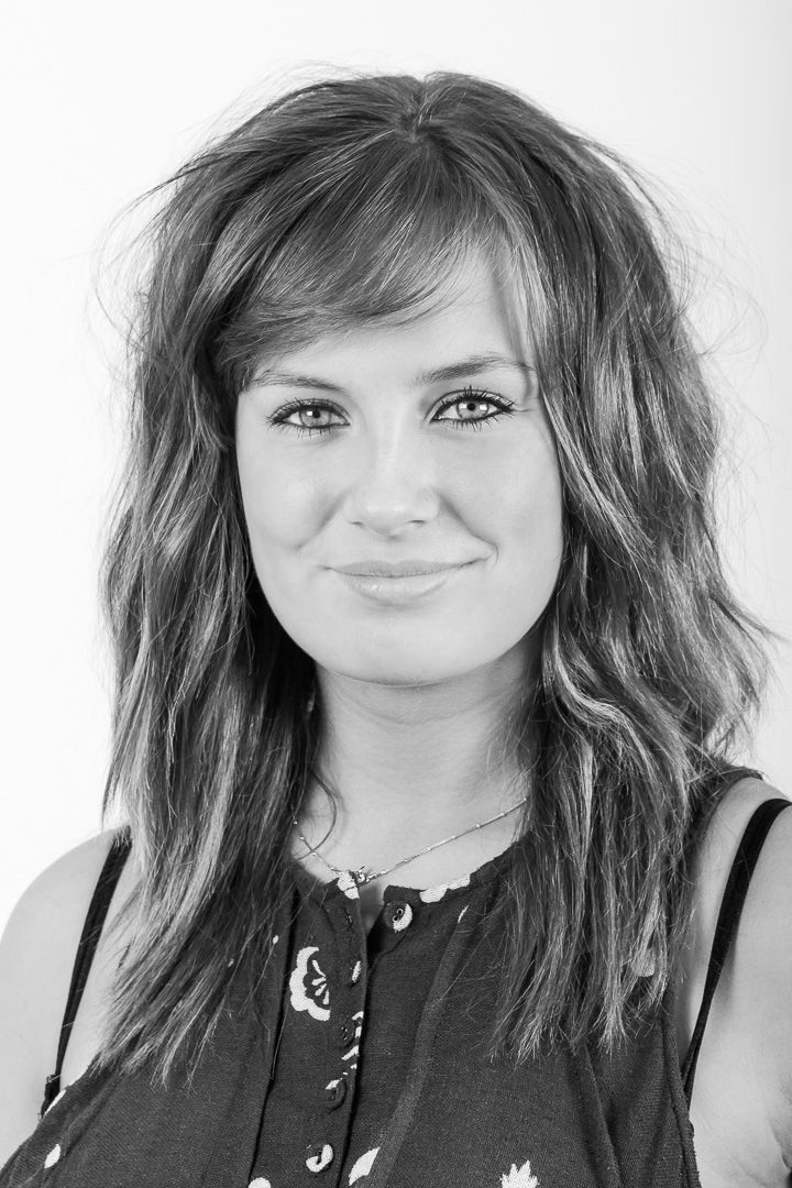 Black and white photo series showing different playful expressions and poses with messy hair and dark clothing.