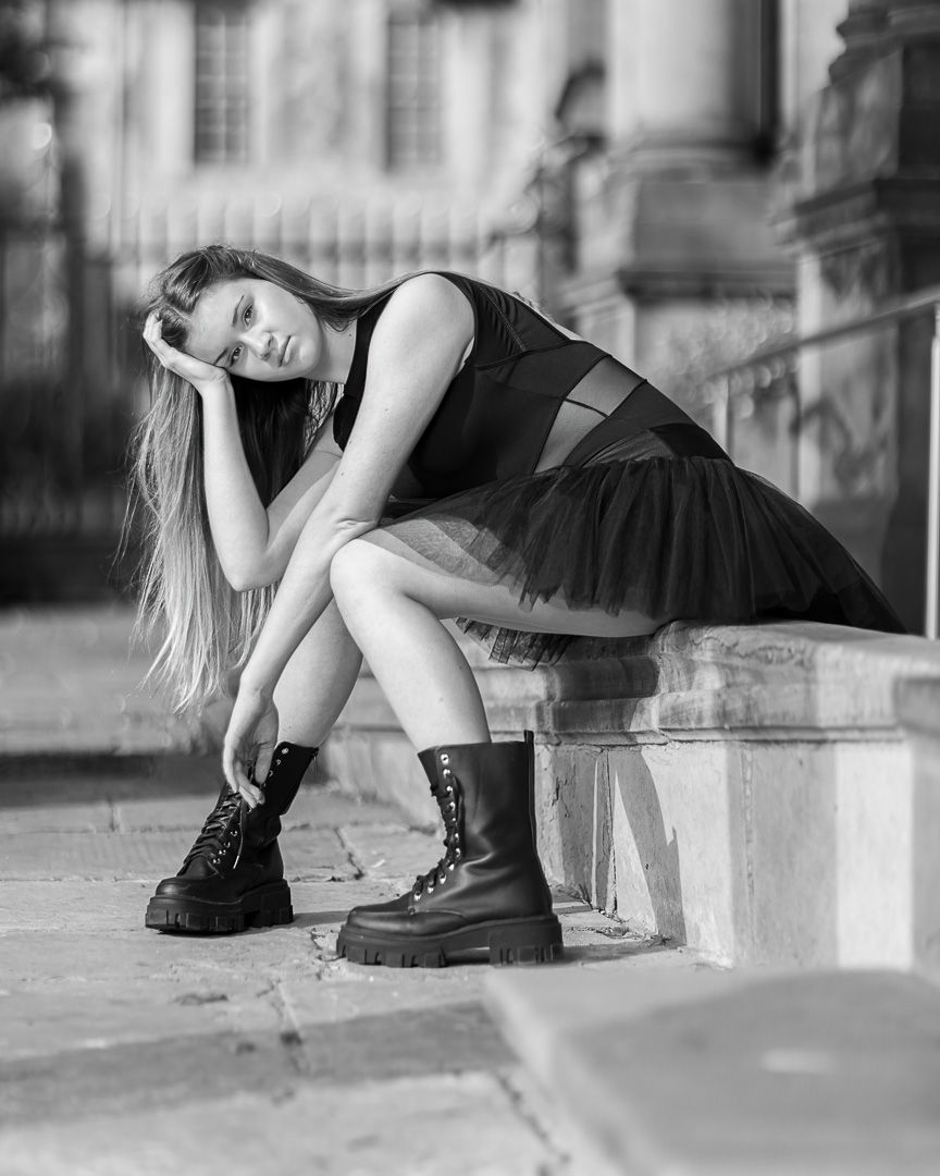 Black and white photo series showing ballet shoes and feet posed against an urban backdrop.