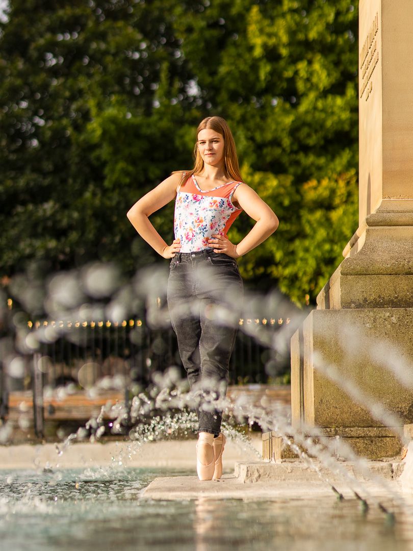 Artistic water splash photography sequence near stone architecture.