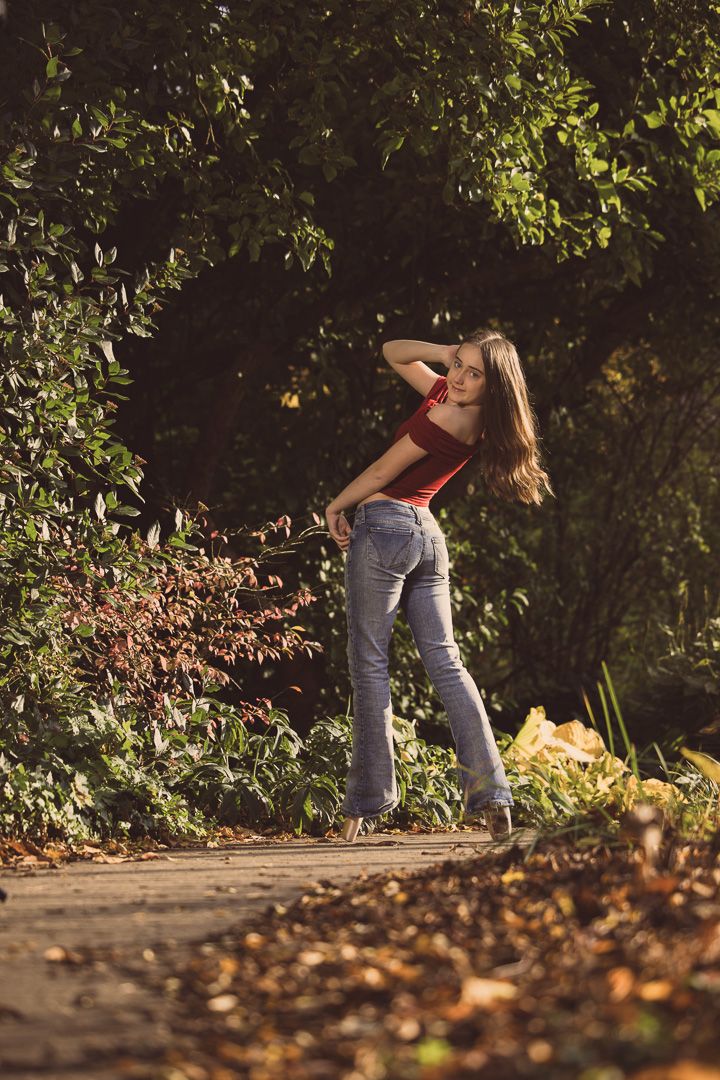 Dynamic movement sequence captured in autumn setting with falling leaves.