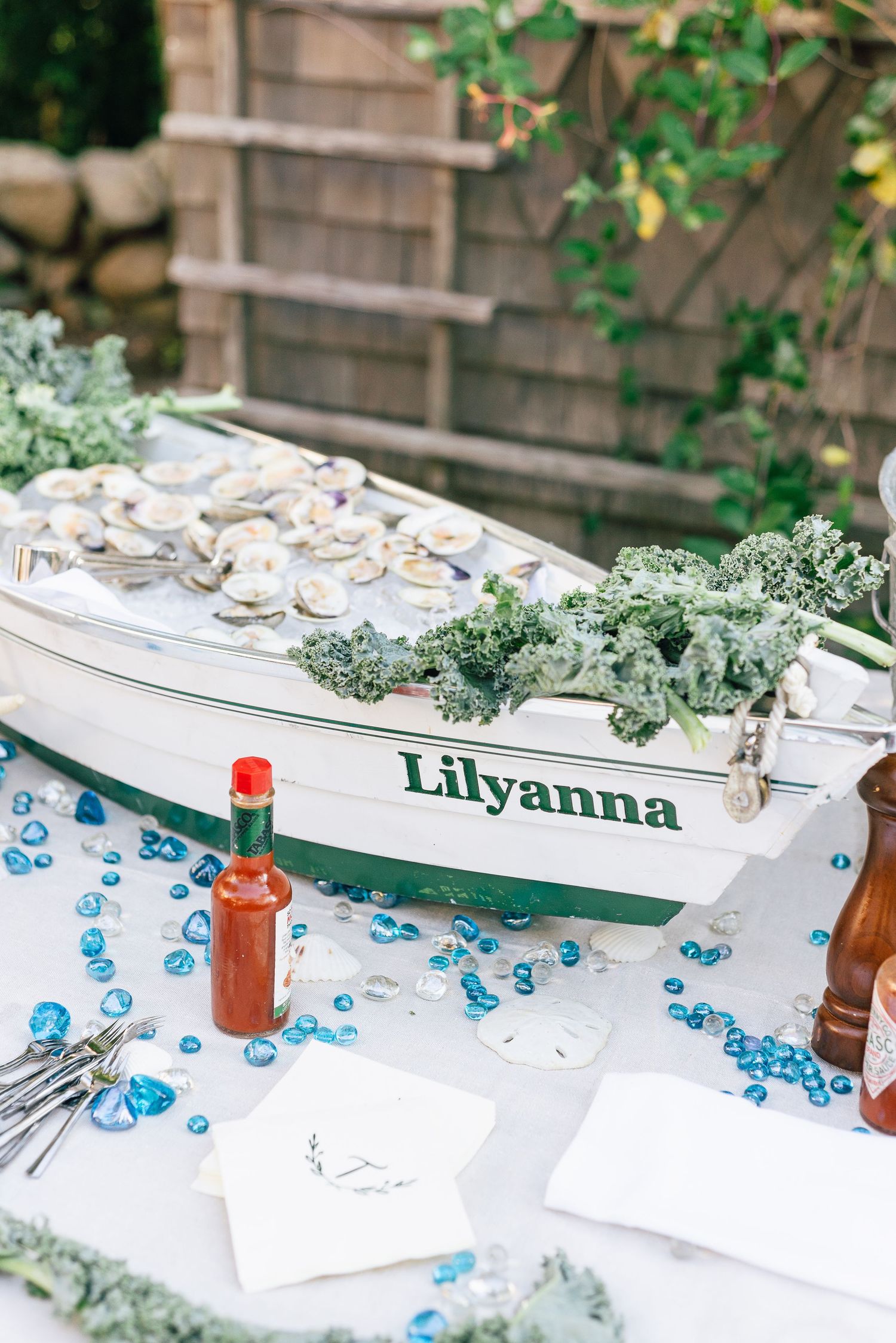 Oysters at a wedding cocktail hour displayed in a boat