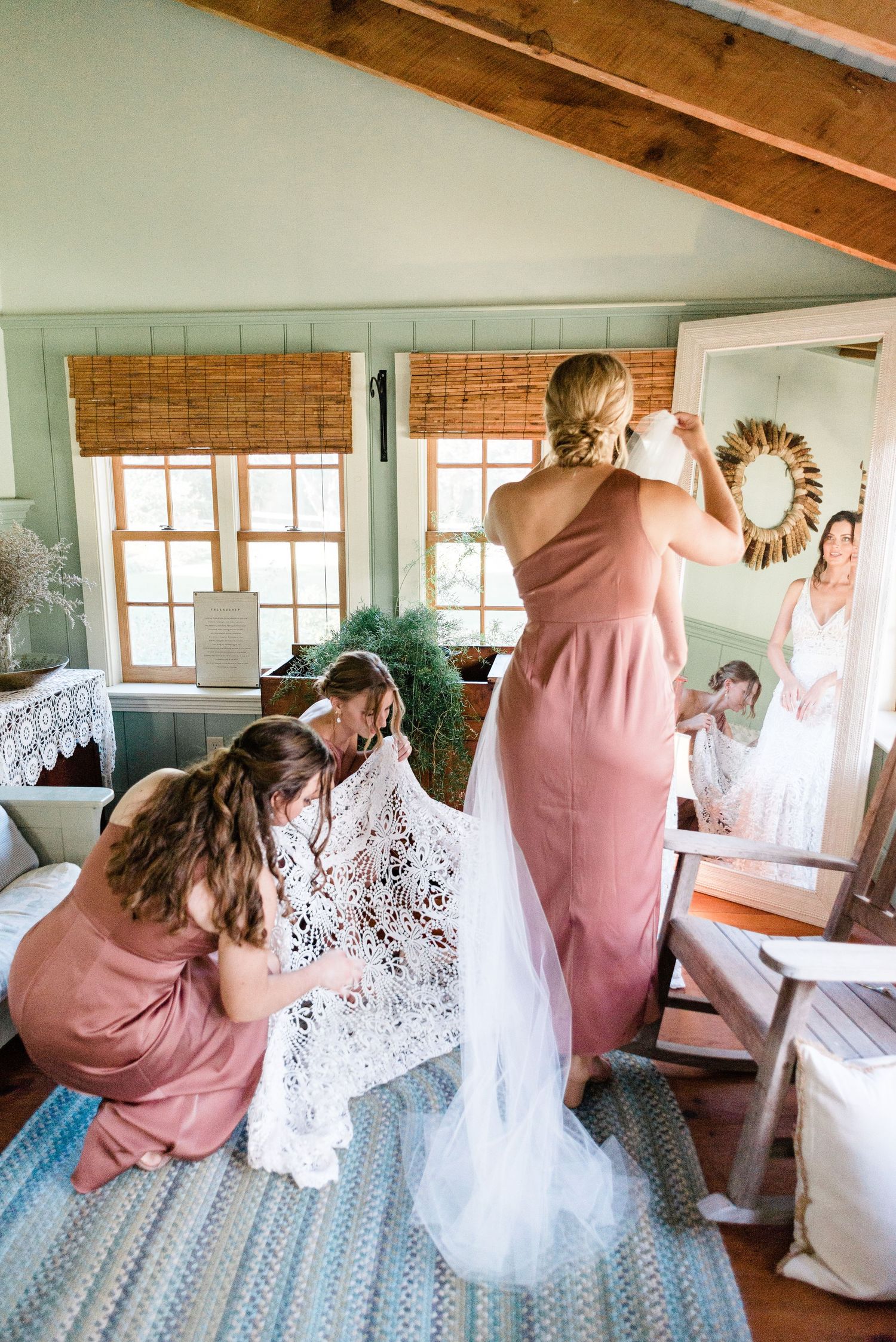 A bride gets ready with her three bridesmaids.
