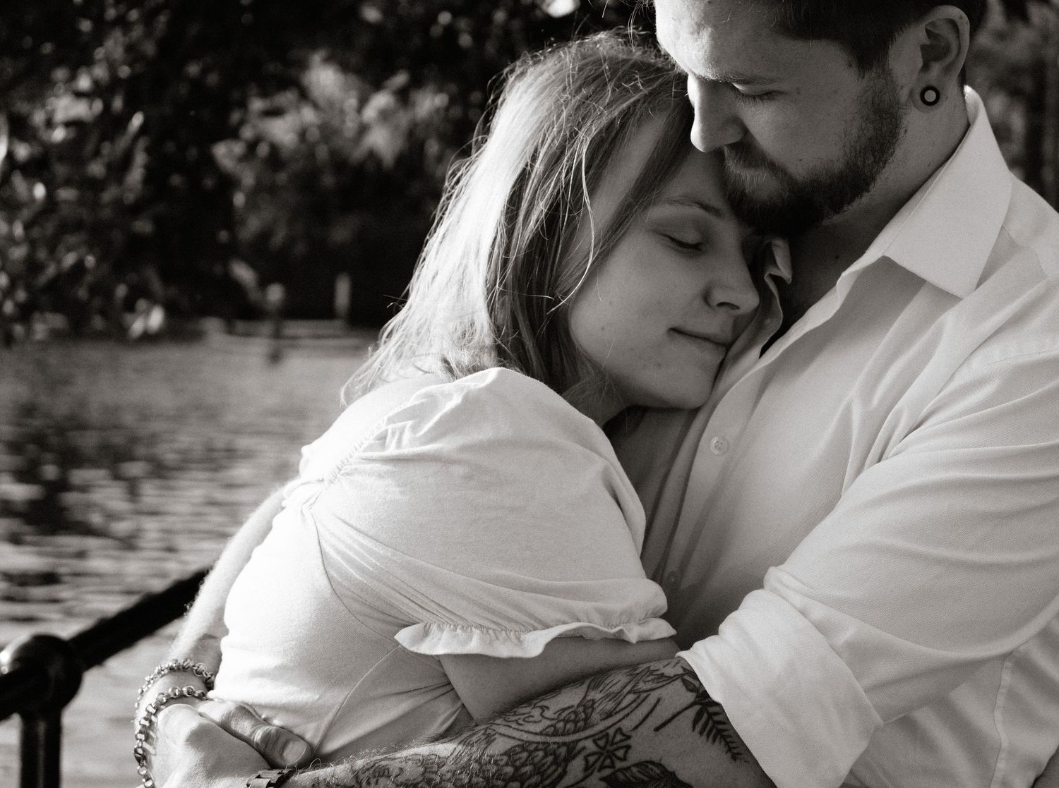 Black and white sequence of tender romantic moments between two people.