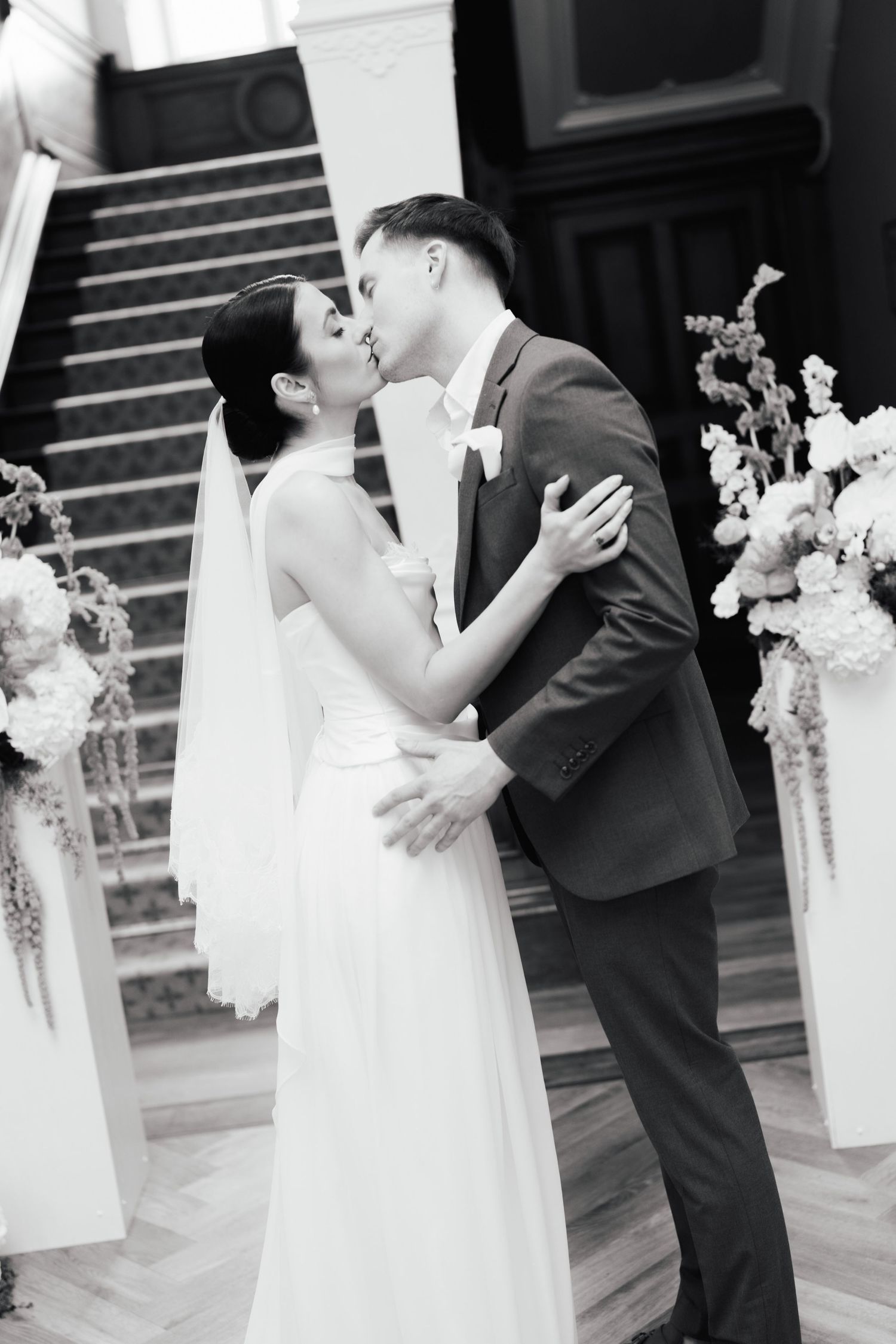 A romantic series of black and white wedding photos showing the couple sharing intimate moments during their first dance.