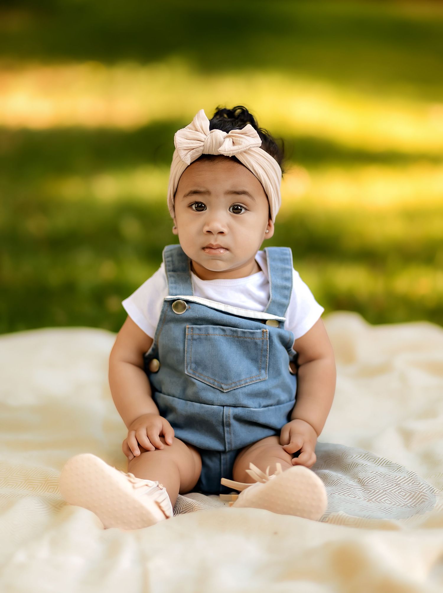 Baby in ogden botanical gardens facing Shys Luxury Photography posed