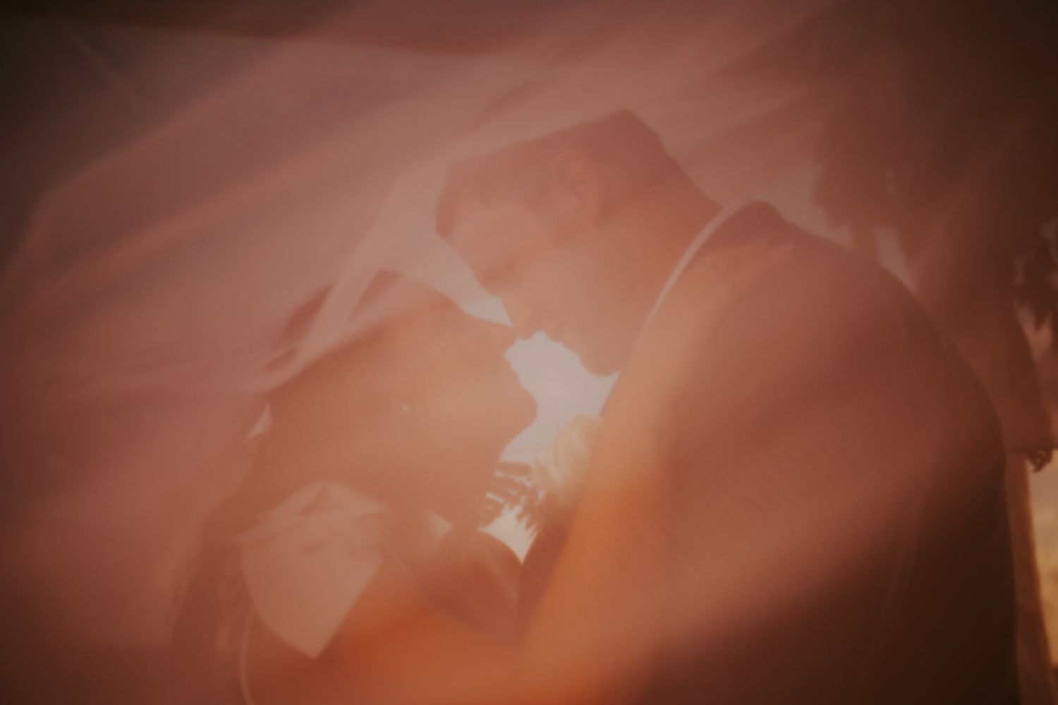 Dramatic copper and brown abstract background texture with warm tones and lighting effects.