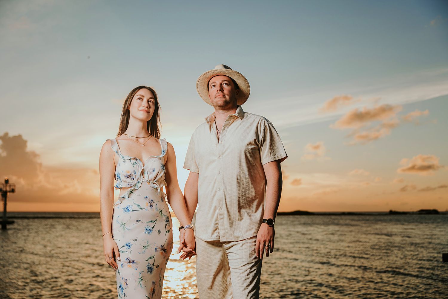 Couple portrait in Aruba with ocean views and golden sunset light
