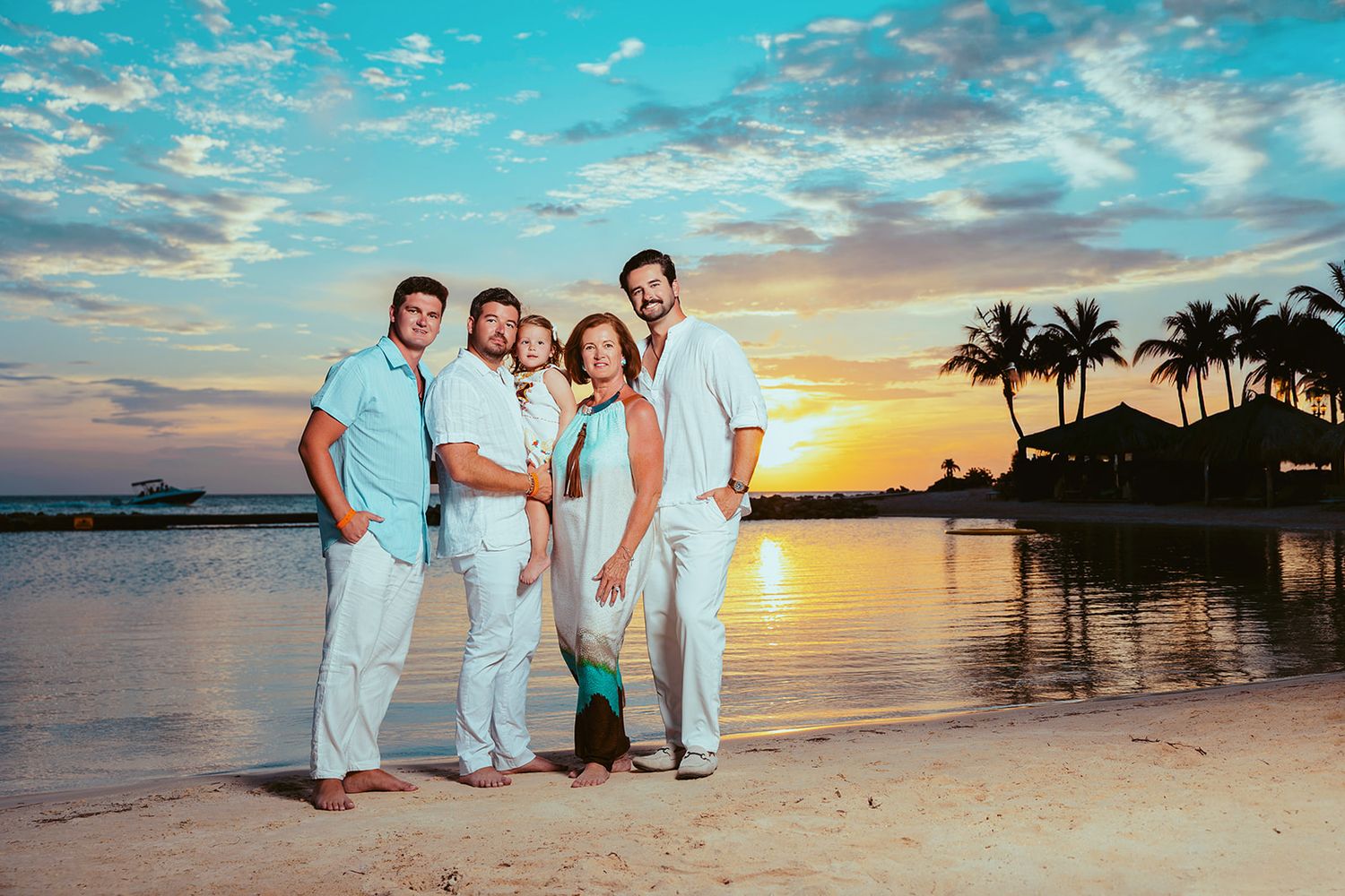 Family photography session on Aruba beach at sunset
