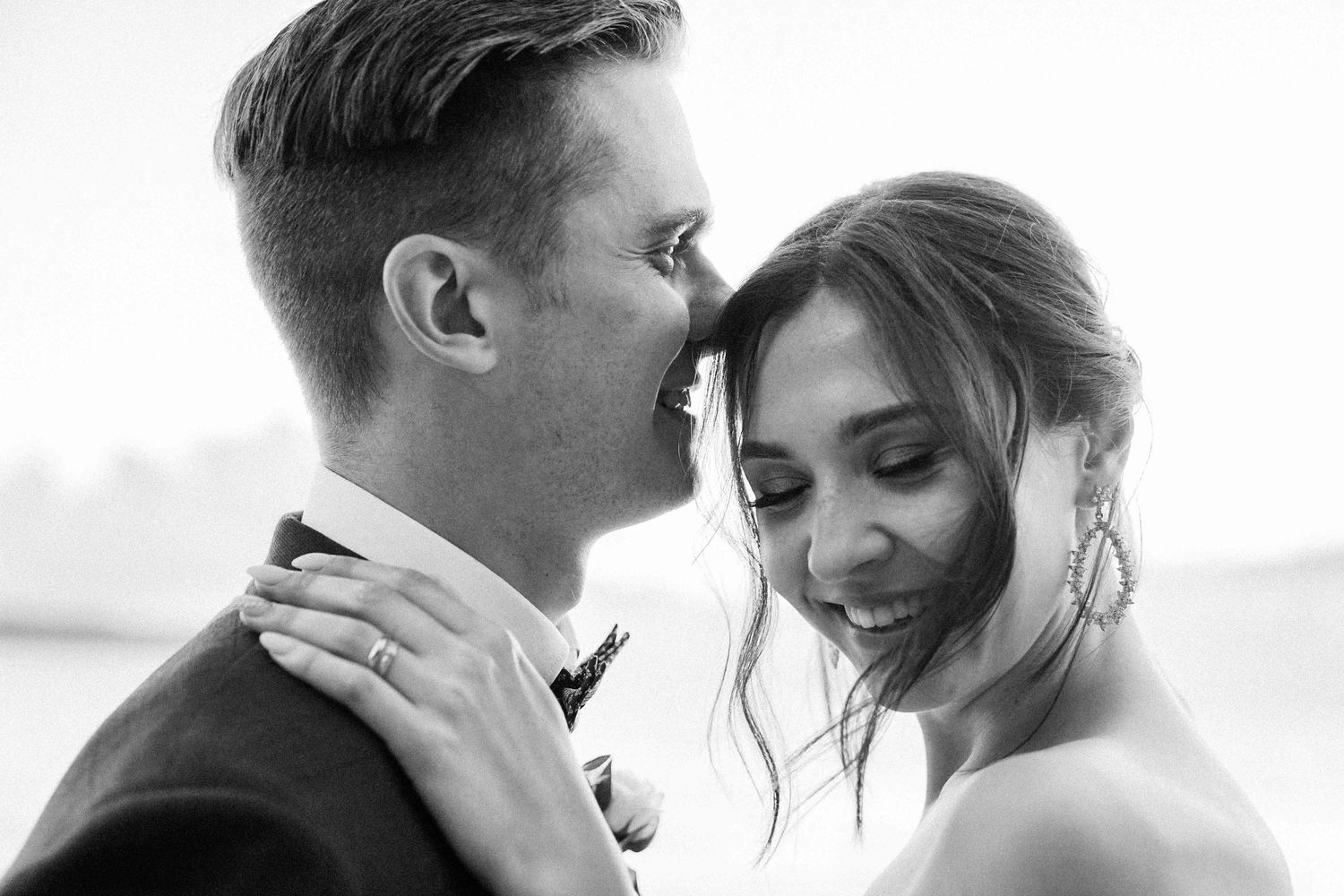 Intimate black and white wedding portraits showing tender moments.