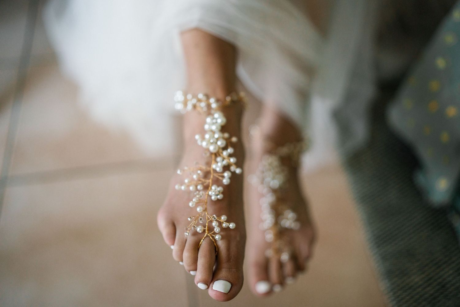 Delicate baby's breath flowers adorning bridal details.