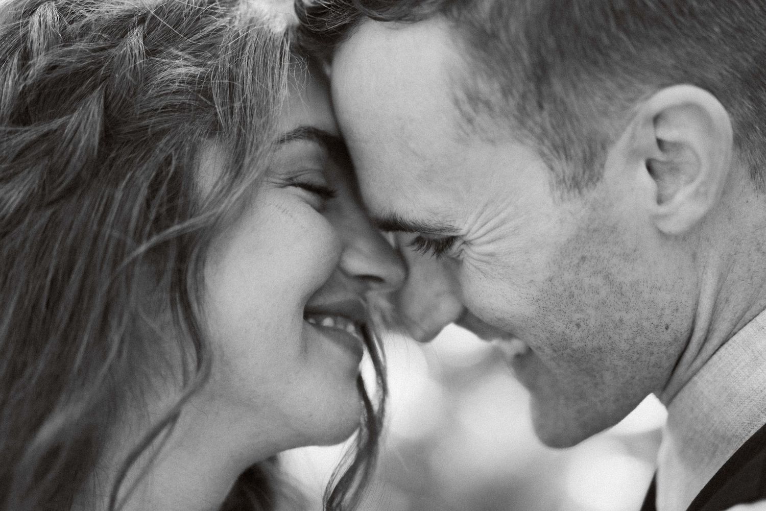 Intimate black and white close-up sequence showing tender romantic moments.