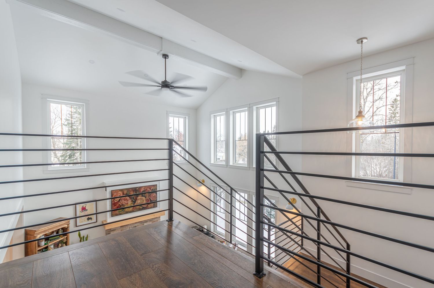 David Spence Photography Central Alberta Real Estate Media new farm style loft space with metal railing HDR image white gold color scheme