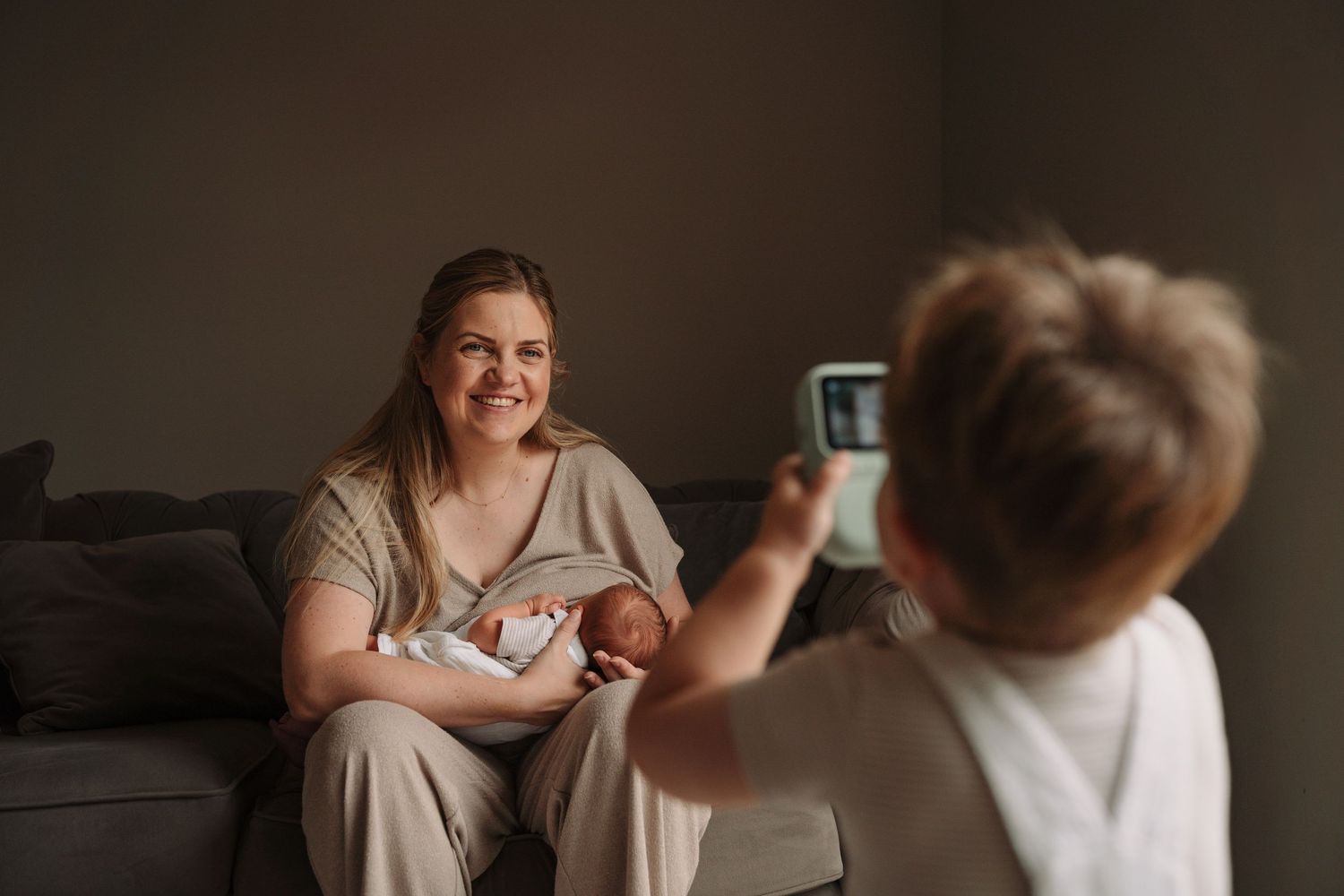 Candid family moment captured in warm, natural lighting.