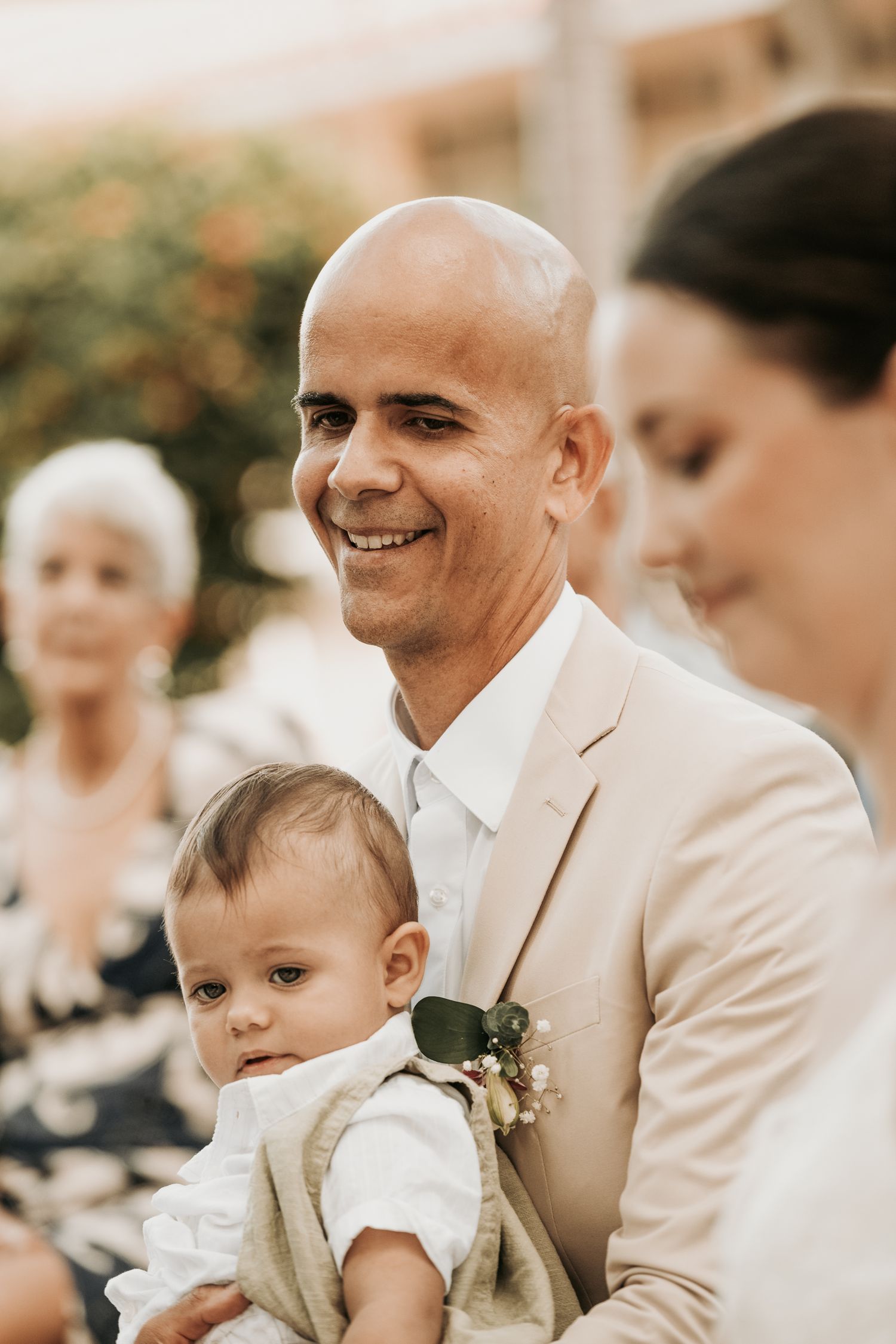 A series of candid moments captured at an outdoor wedding celebration in warm lighting.
