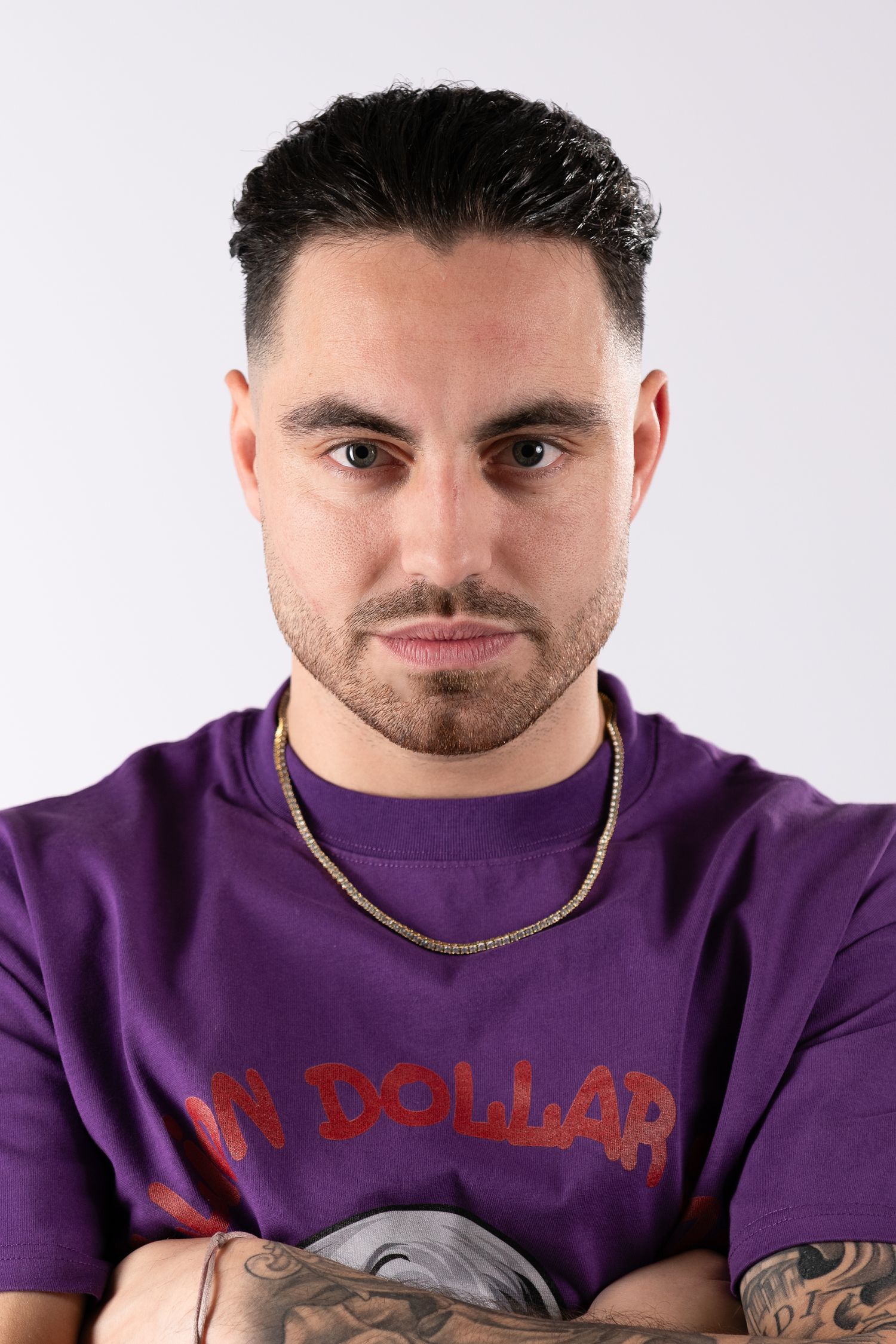 Person in purple sweatshirt showing different poses against white background.