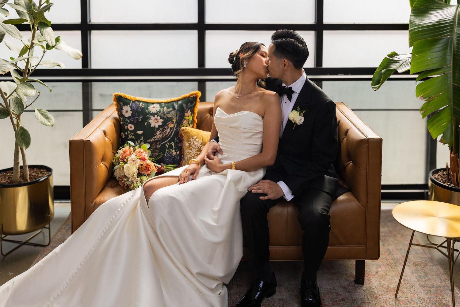 Bride and groom kissing at wedding in Brooklyn New York,