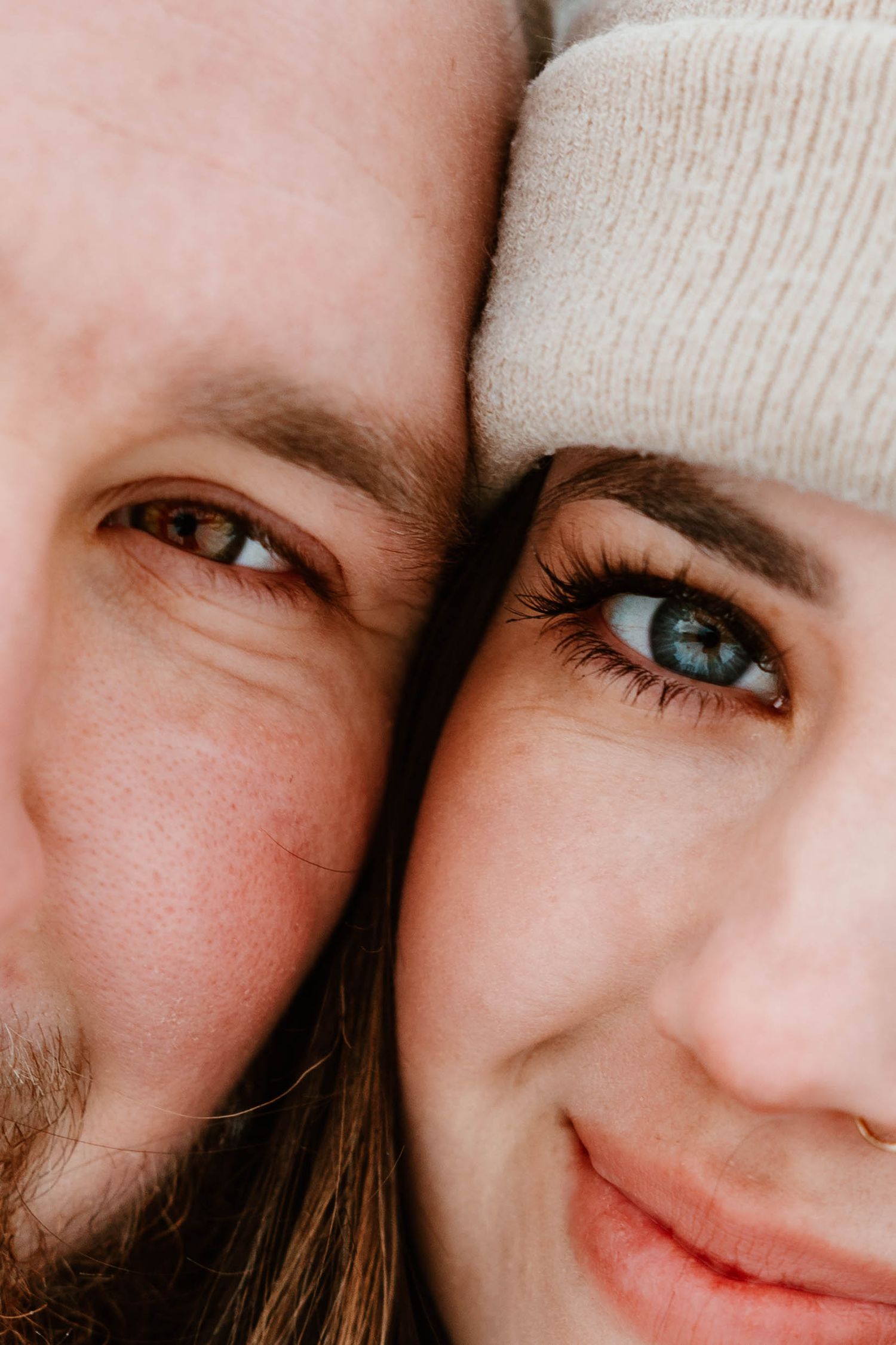 Intimate close-up portrait series showing warm expressions and connection.