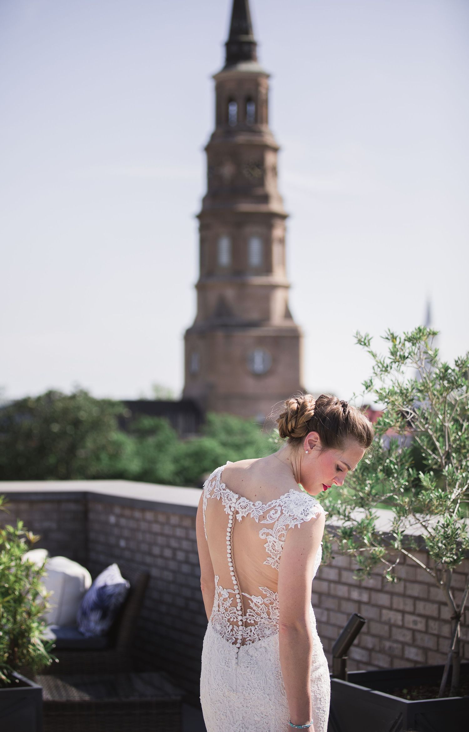 Beautiful bride to be in a stunning portrait in front of one of the beautiful churches in Charleston, SC.