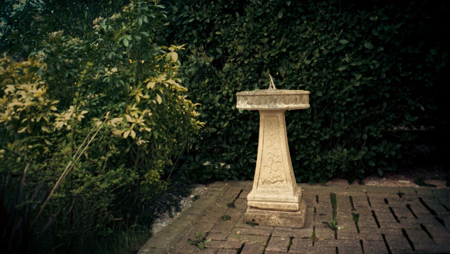 Analogue photo of a sundial on APS camera.