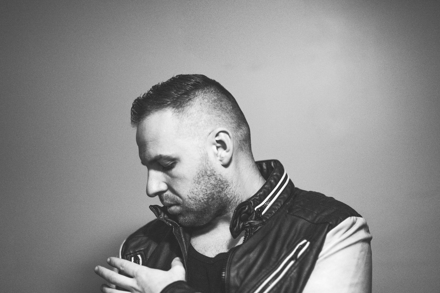 A black and white portrait series showing artistic profile poses.