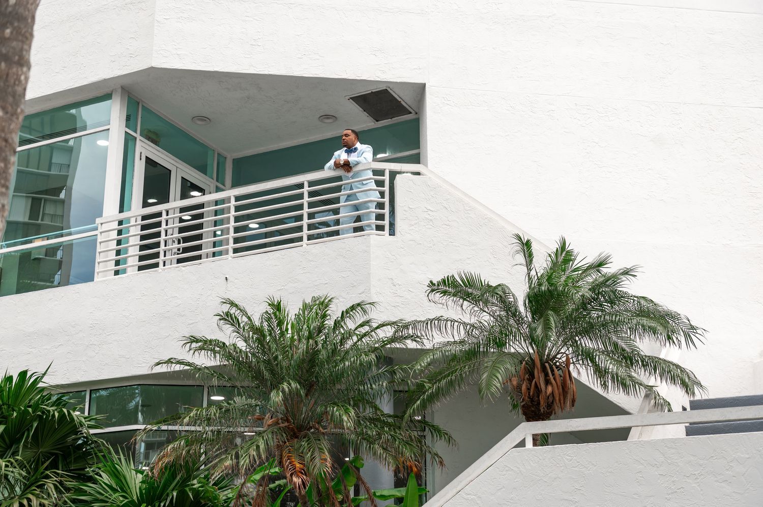South Florida wedding photographers captured the groom looking over the water before his Yacht wedding in Fort Lauderdale.
