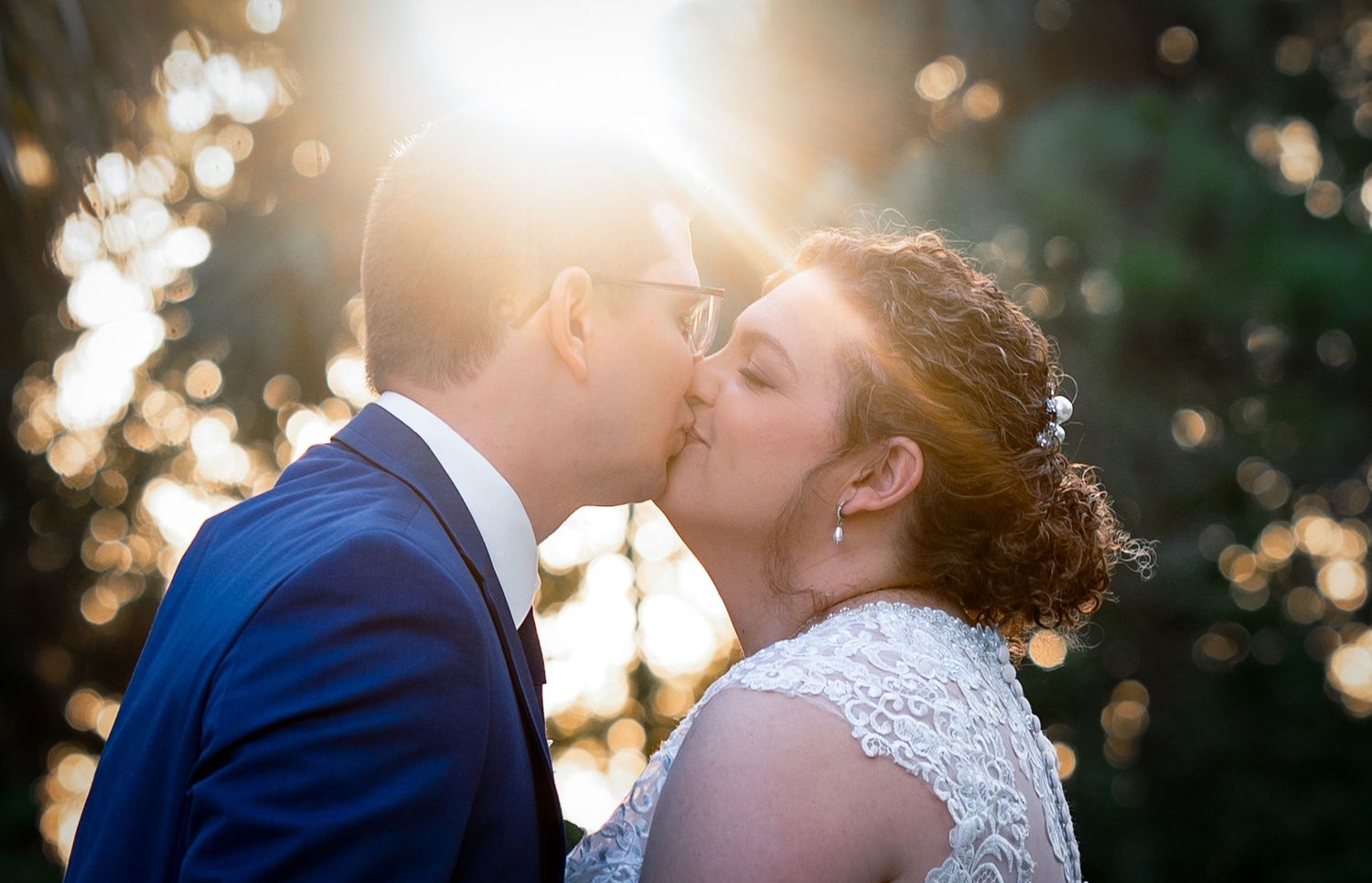 Destination wedding photographers in Florida photographed this couple kissing under the Florida sun during their destination wedding.