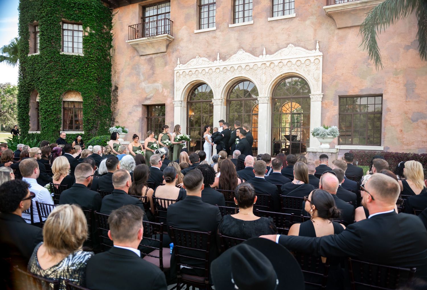Howie Mansion wedding ceremony captured by Destination wedding photographers in Florida.