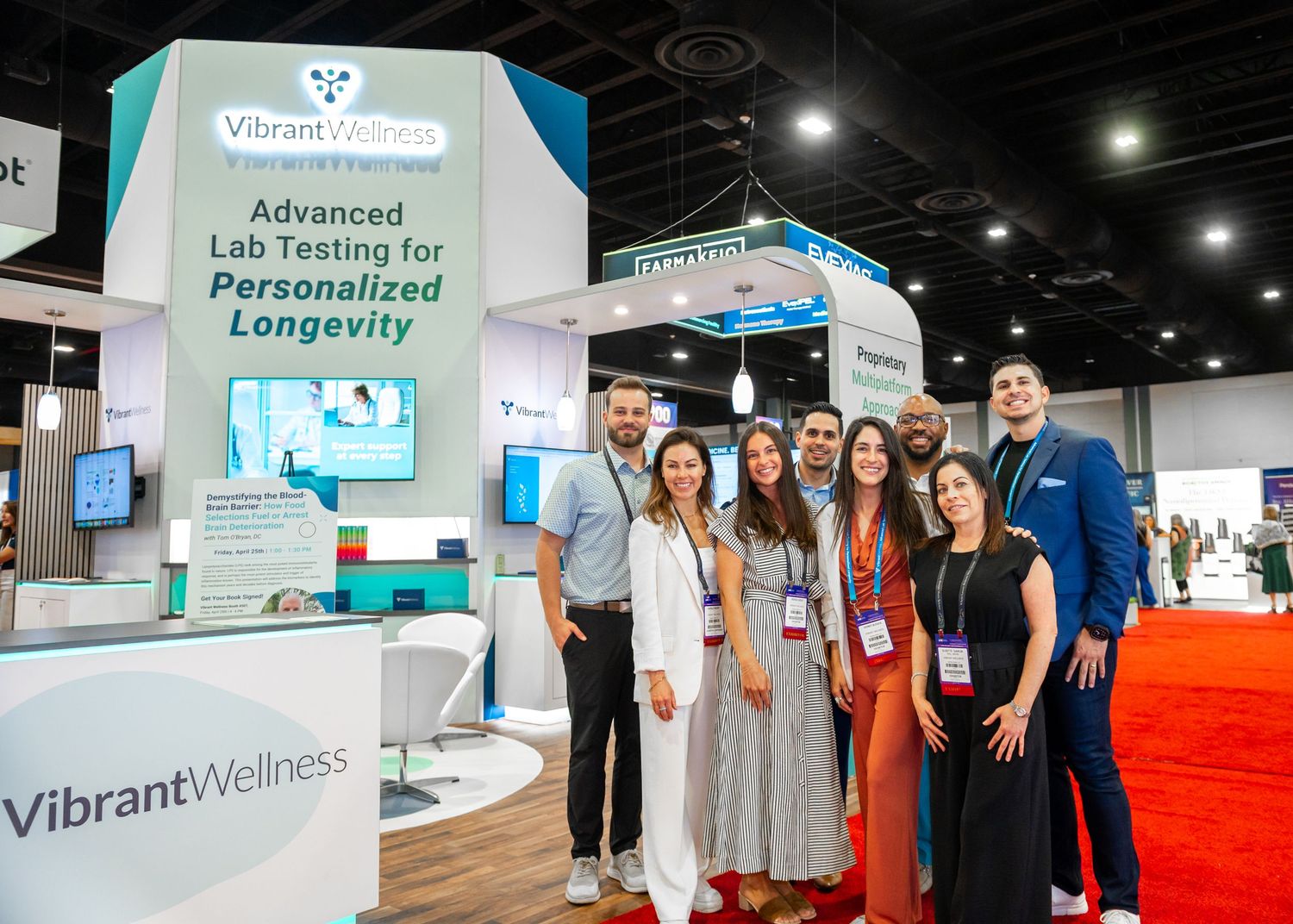 Palm Beach corporate event photographers captured the team at Vibrant Wellness at the Palm Beach County Convention Center.