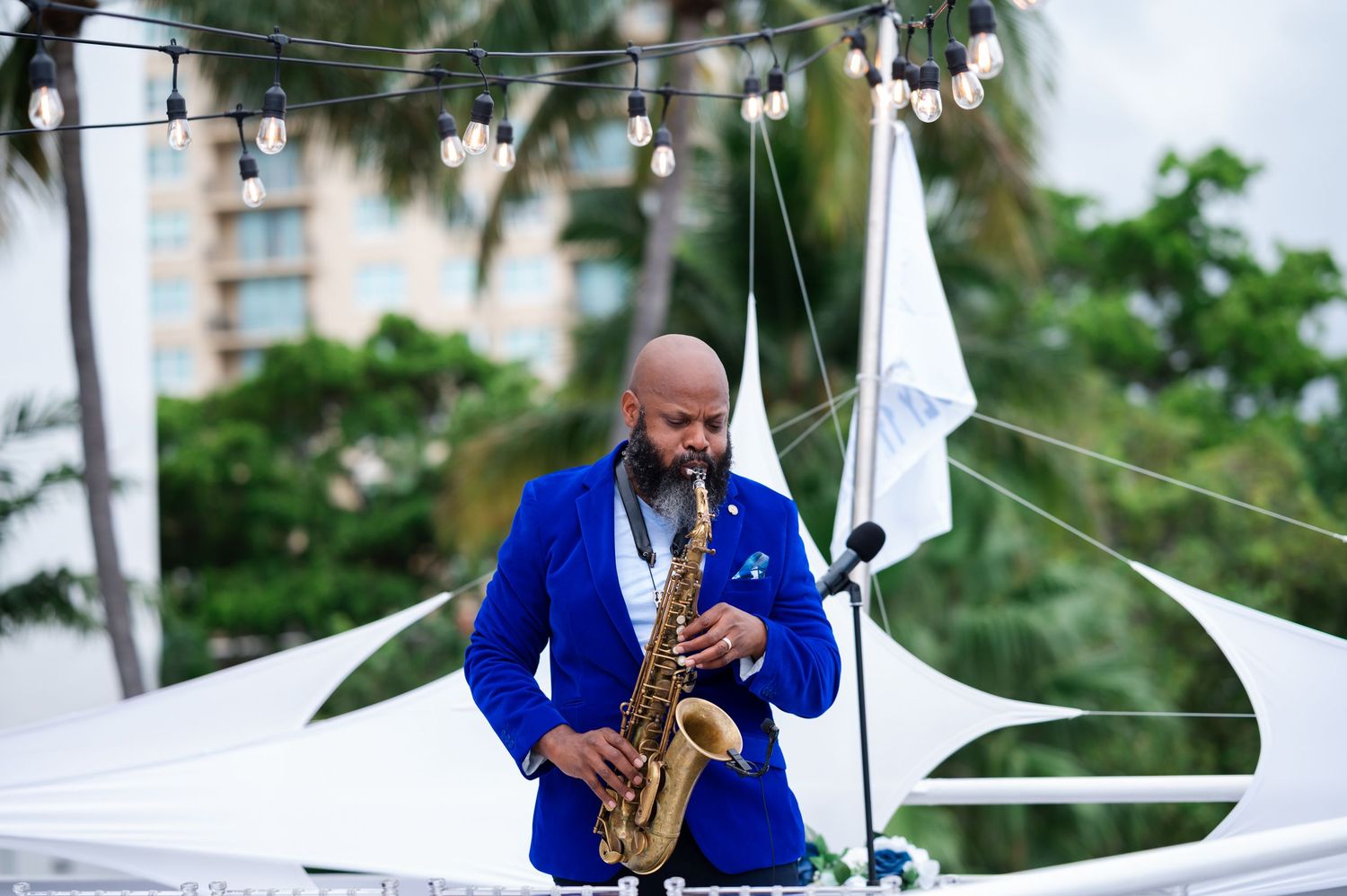 Groomsmen in various shades of blue suits on Sun Dream Yacht Caprice