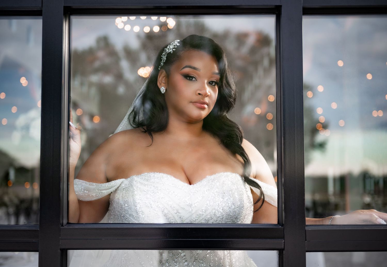 South Florida wedding photographers captured the bride through the glass at Scars Farm.