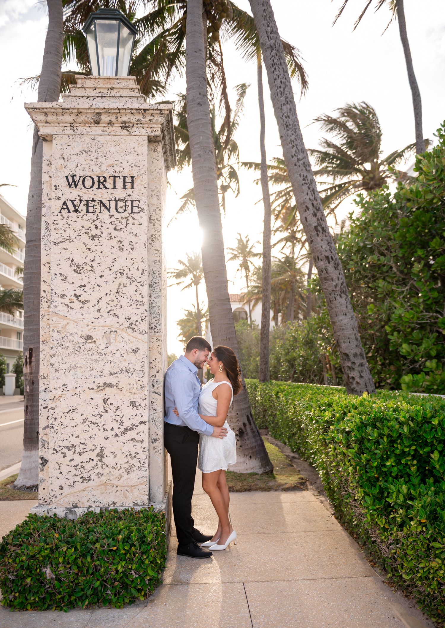 Romantic couple portrait at Worth Avenue in Palm Beach Florida during golden hour engagement session