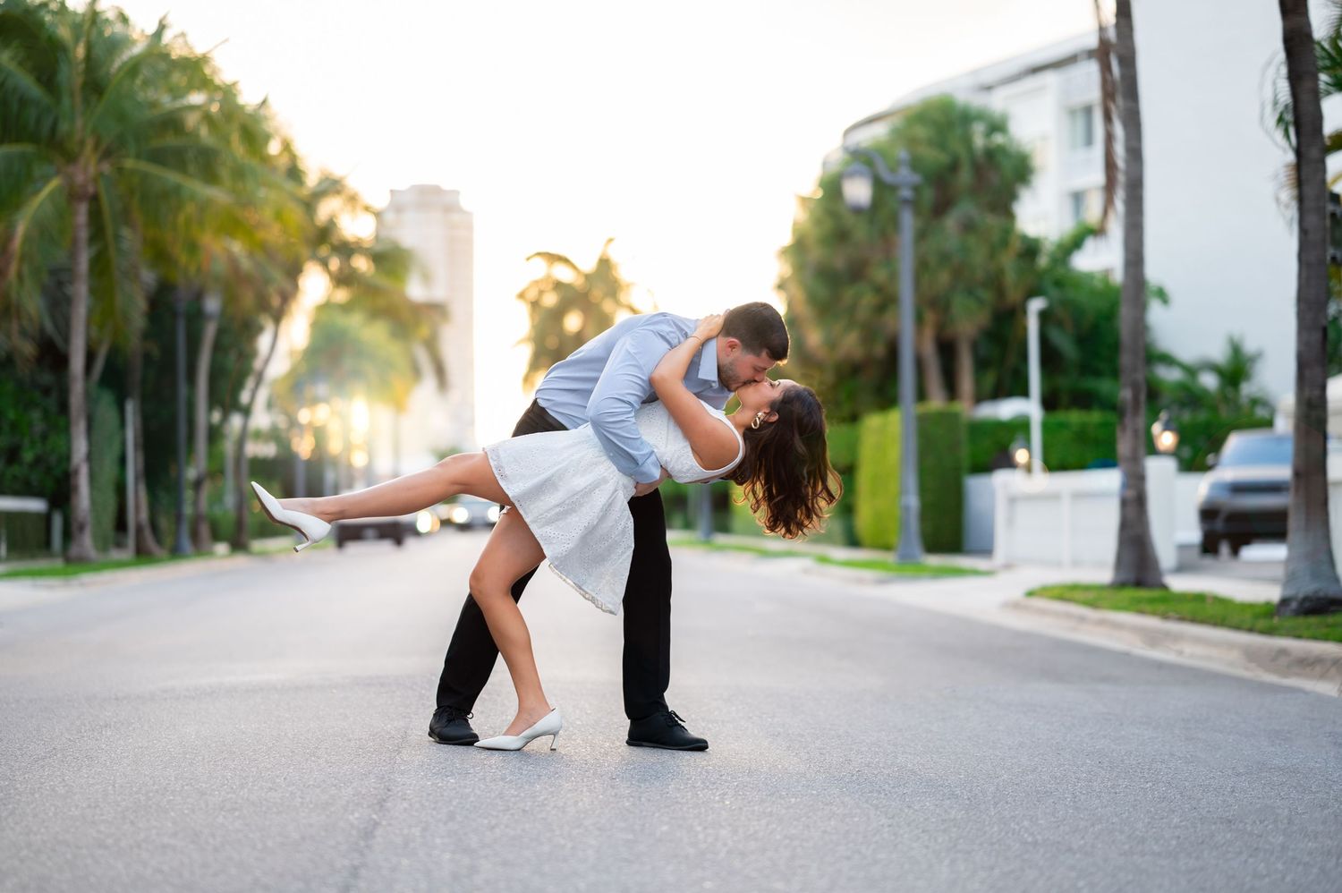 South Florida engagement photographers captured the dip in the streets of Palm Beach.