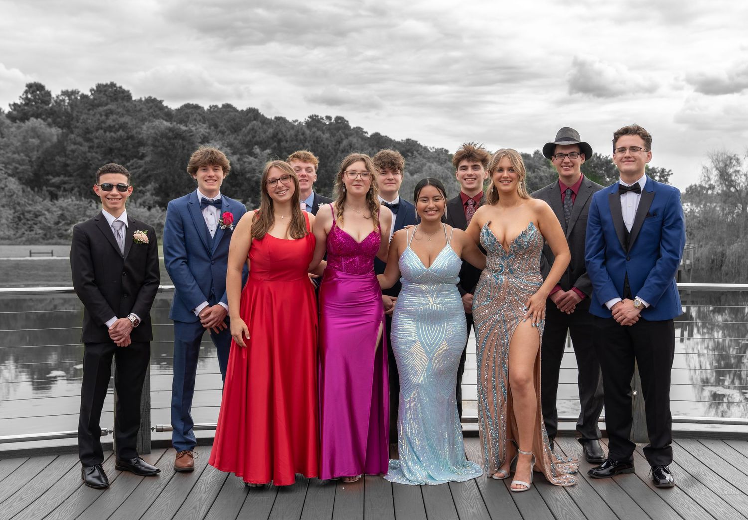 Mooresville High School seniors smiling together for a group prom photo.