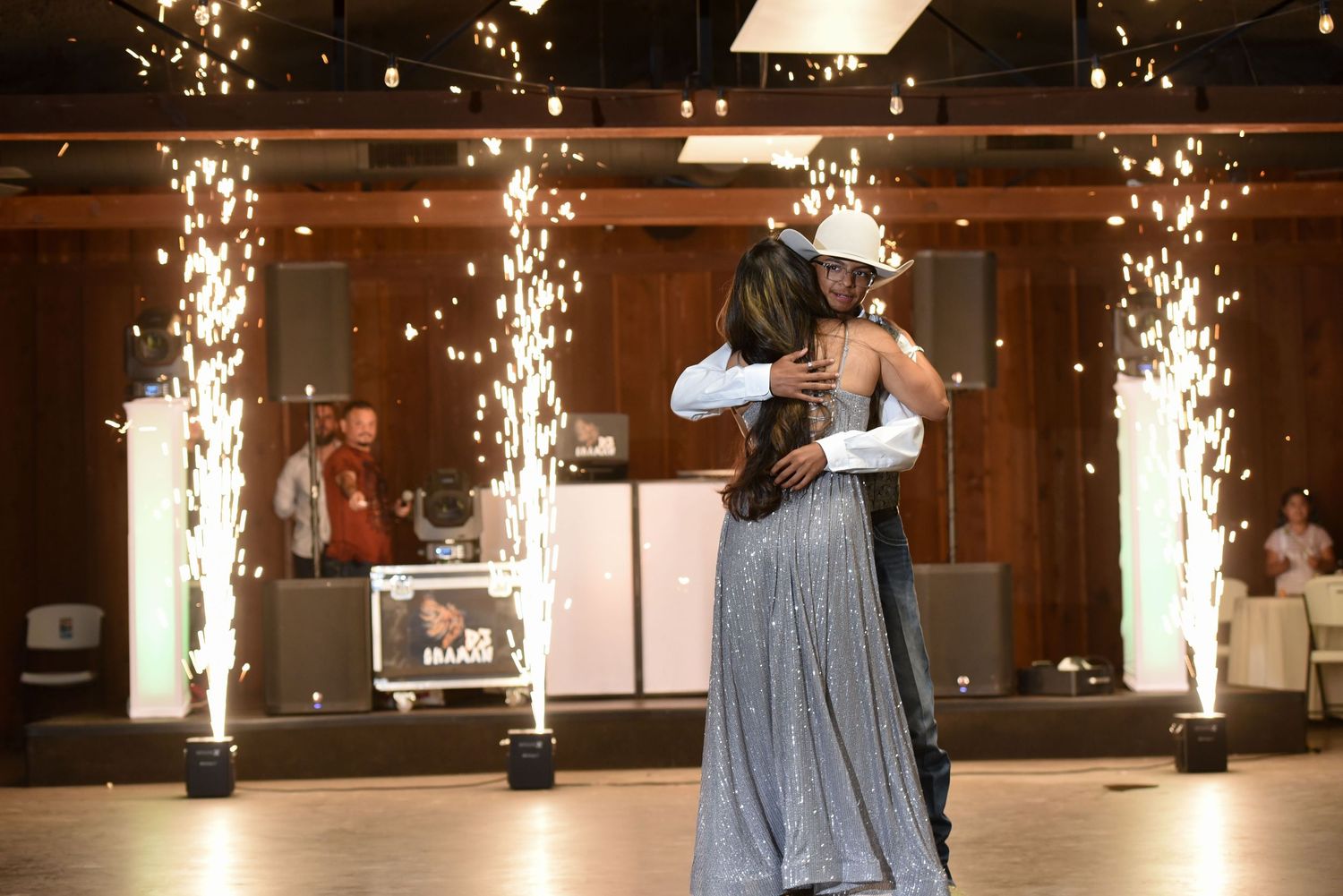 Fort Worth Quinceañero photoshoot ideas feature western style, cowboy boots and Charro outfits for boys celebrating their 15th birthday