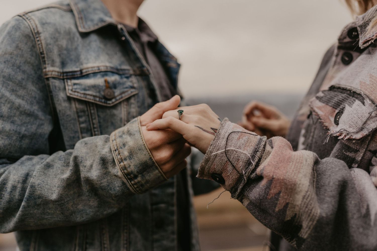 engaged couple posing in the a small town in north carolina