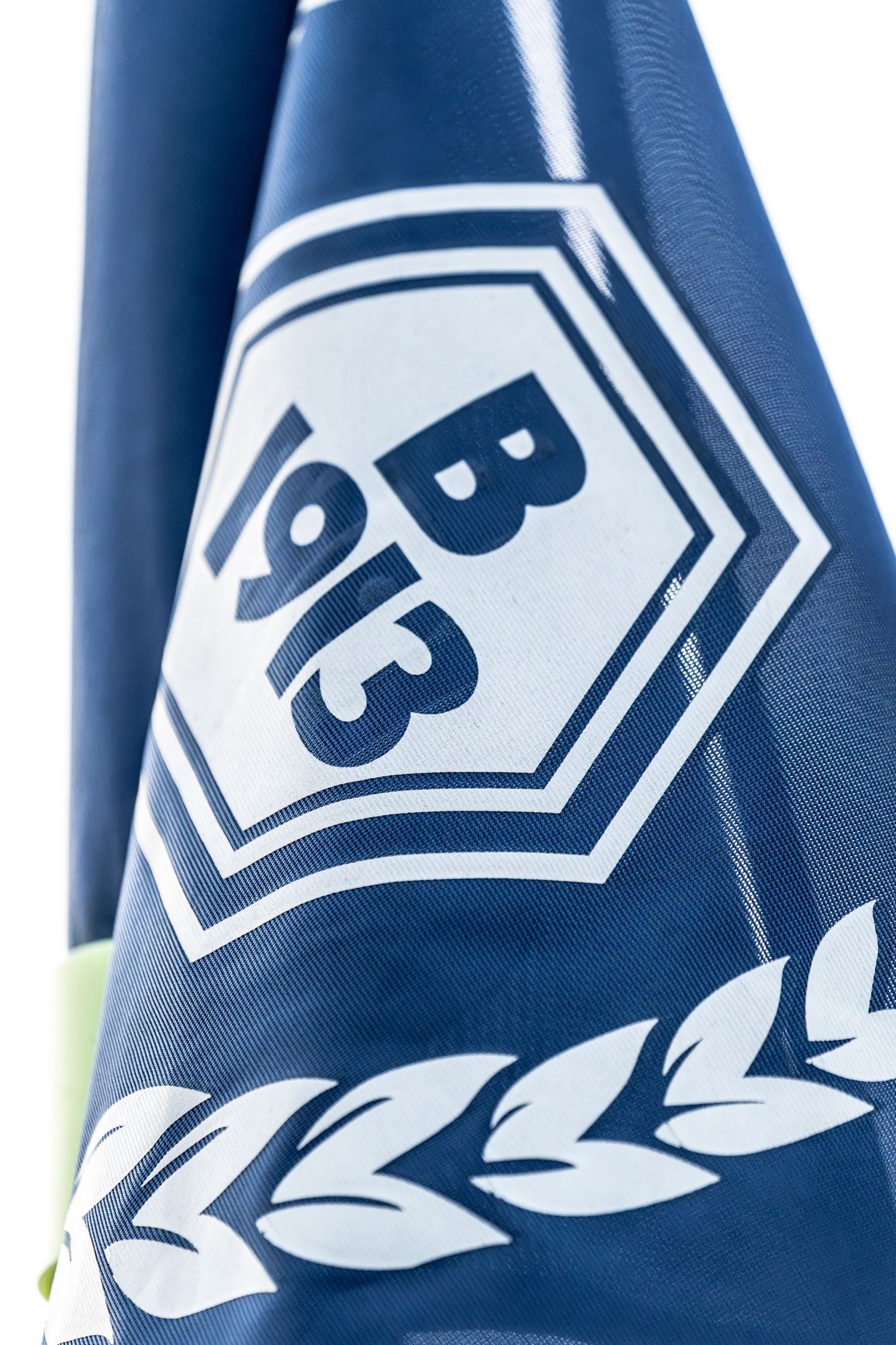 Close-up of a blue and white soccer corner flag featuring the BB 1913 club crest and laurel wreath.
