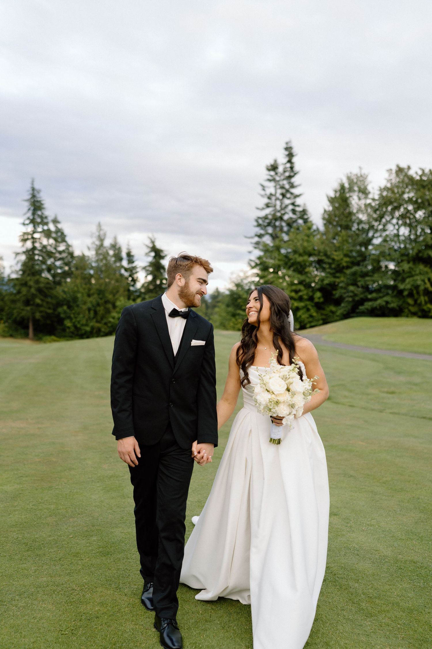a bride and groom walking together