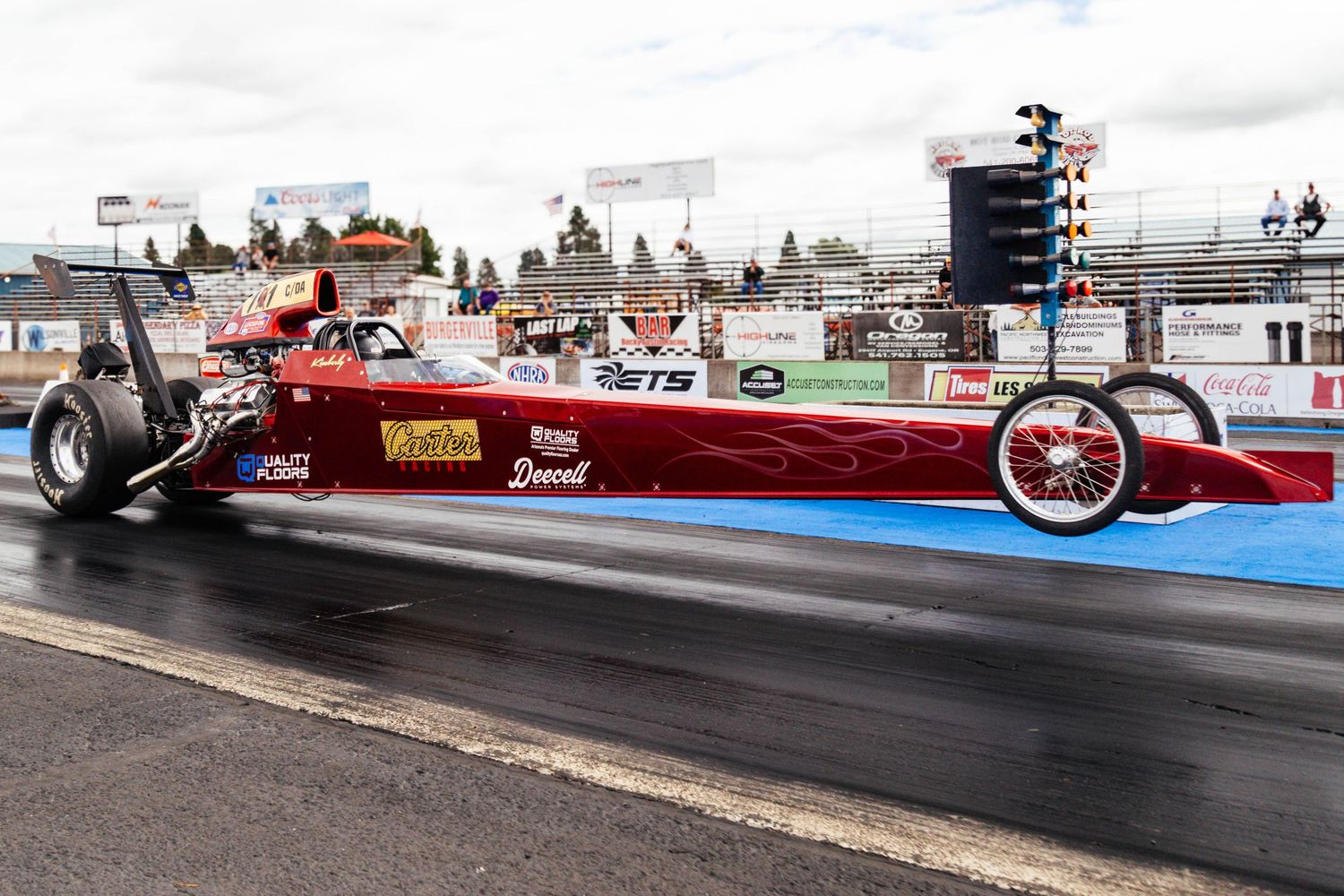 Alcohol dragster launches from the line at the Woodburn Drag Strip at the 2026 Lucas Oil Championship.