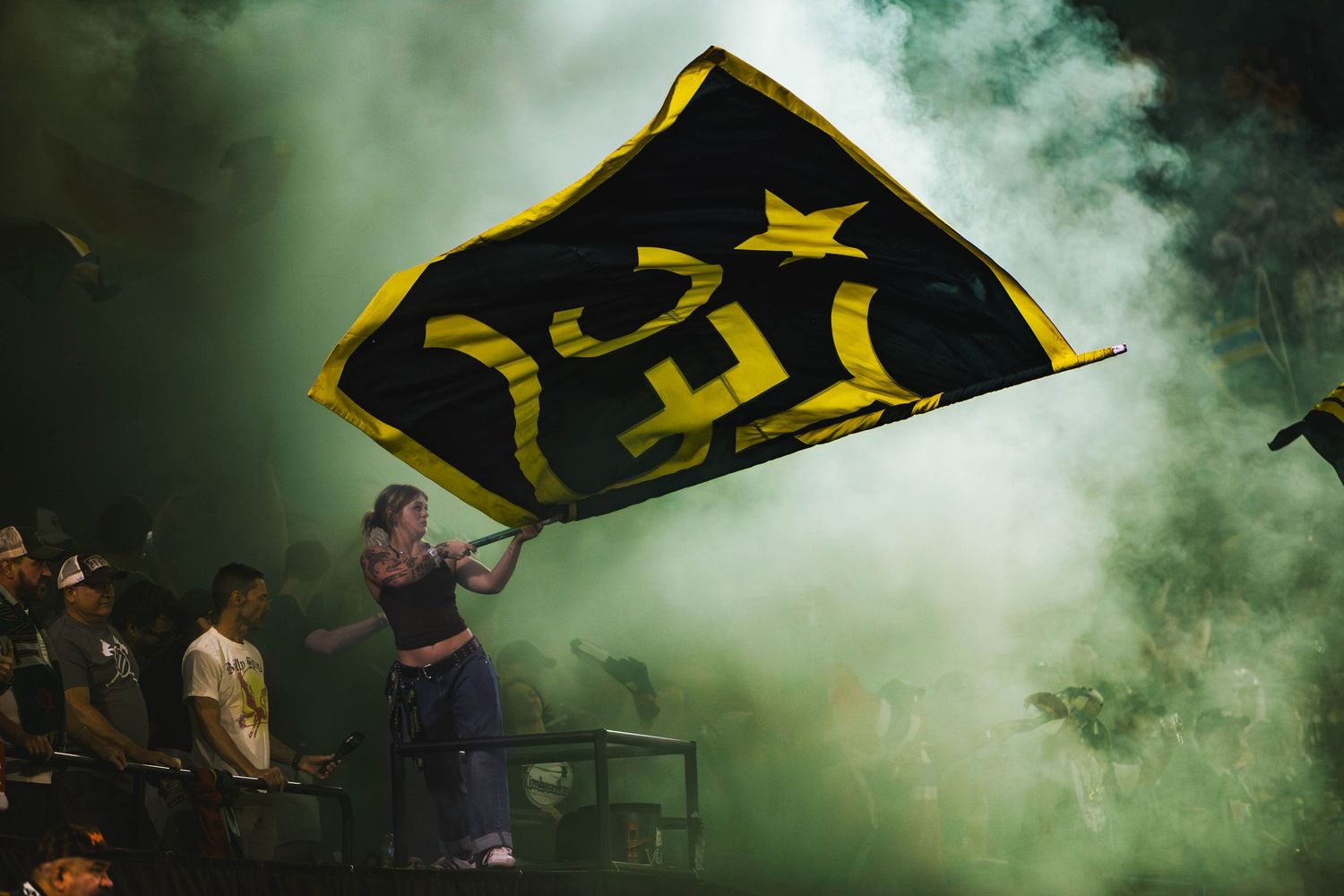 Portland Timbers players competing against St. Louis CITY SC during a Major League Soccer match at Providence Park in Portland, Oregon.