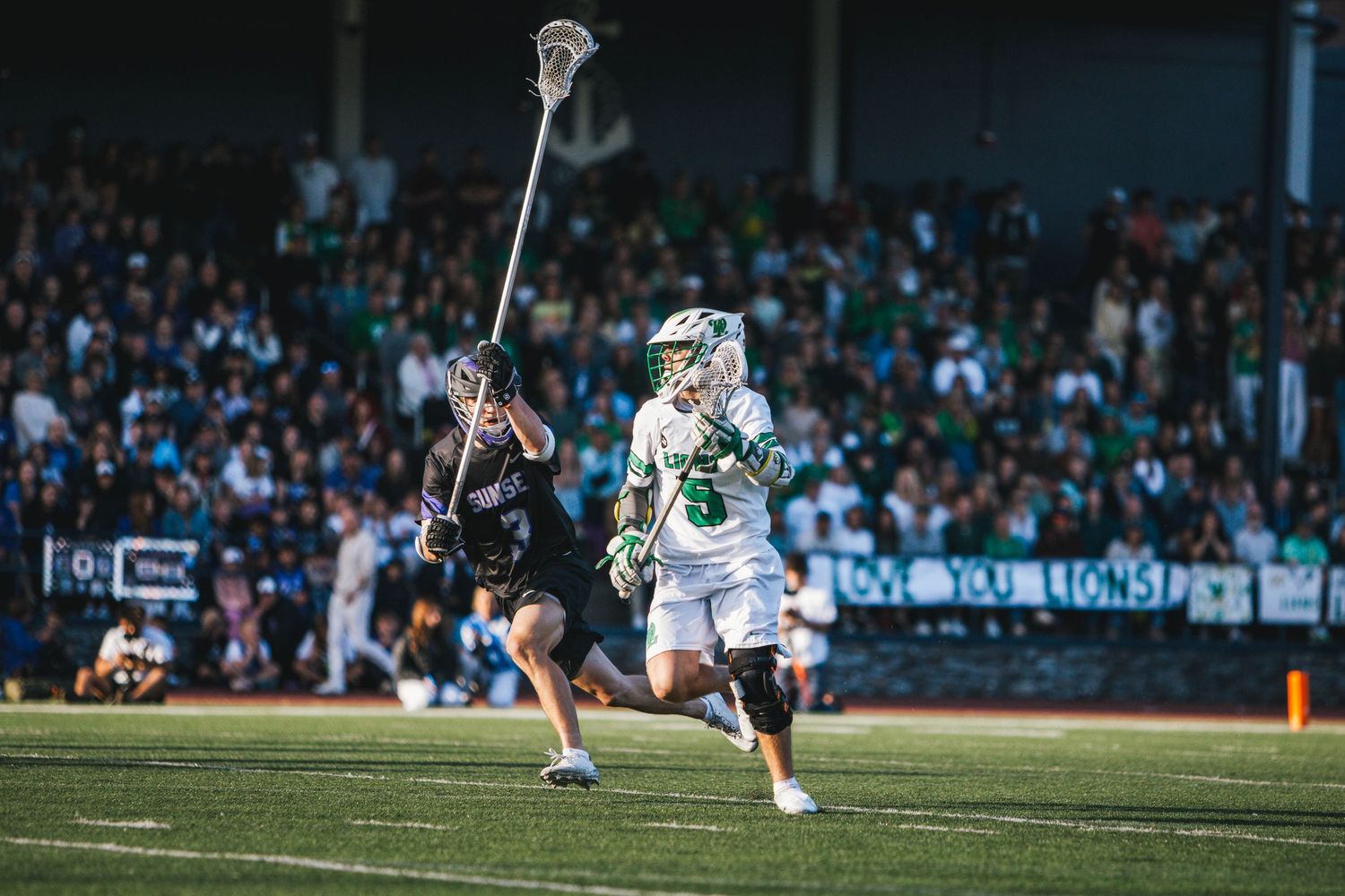 West Linn Lions Varsity Lacrosse fighting for a title at Lake Oswego High School in Oregon.