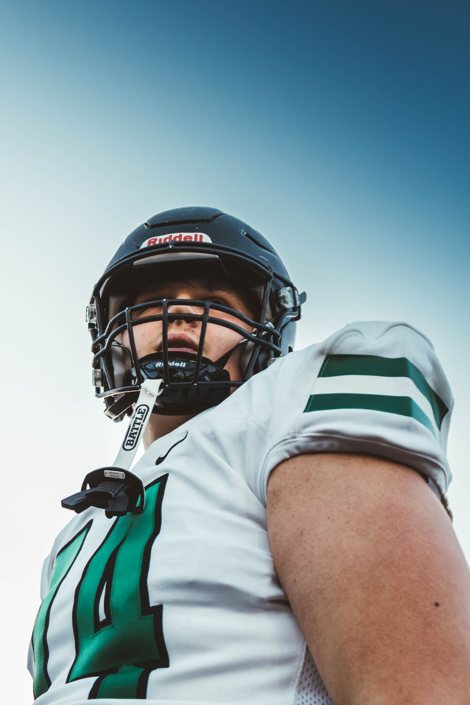 West Linn Lions football players competing during a high school football game in West Linn, Oregon.